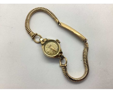 Rodania; 17 Jewels Vintage Ladies Wristwatch, the signed dial with gilt Arabic quarterlies and baton markers, within shaped c