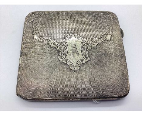 A Hallmarked Silver Cigarette Case, J.G.Ltd, Birmingham 1929, of rectangular form with allover engine turned design, scrollwo