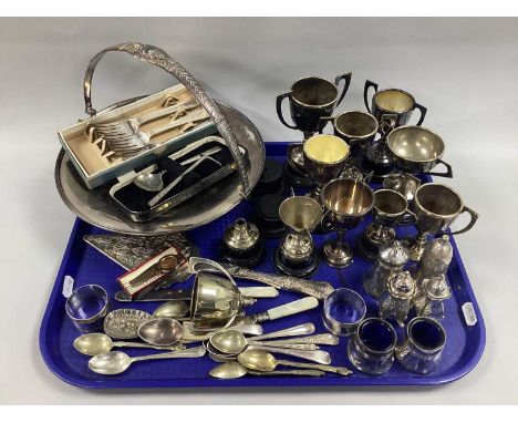 A Twin Handled Footed Swing Dish, a collection of various trophy cups, cruets, blue glass lined salts, a cased spoon and push
