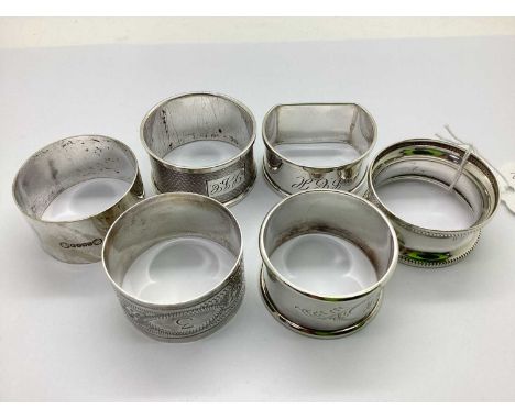 A Collection of Hallmarked Silver Napkin Rings, to include Sheffield 1930, Birmingham 1904, Birmingham 1948, Birmingham 1924,