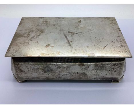 A Vintage Art Deco Style Cigarette Box, of plain rectangular form, the hinged lid enscribed "Presented To Mr. Alan Phillskirk