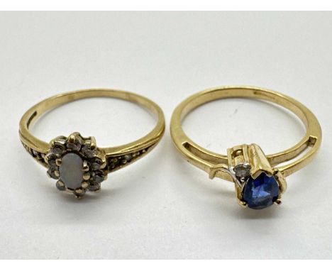 A Modern 9ct Gold Diamond and Stone Set Ring, the teardrop centre stone, claw set with diamond inset highlight, between sinuo