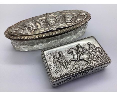 A Scottish Hallmarked Silver Snuff Box, BM, Edinburgh 1935, of rectangular form with highly decorative hinged lid, depicting 