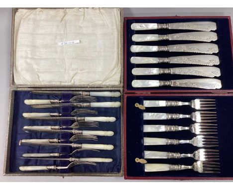 A Set of Six Cased Mother of Pearl Handled Fish Cutlery, stamped "EB&amp;Co A1" to highly decorative prongs and blades, in a 