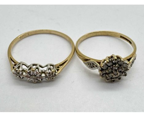 A 9ct Gold Diamond Cluster Ring, claw set throughout between diamond inset shoulders of crossover design (finger size J1/2); 