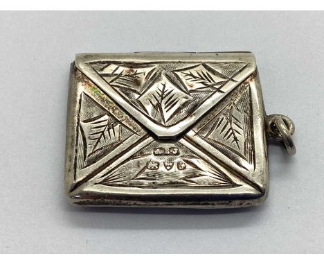 An Edwardian Hallmarked Silver Stamp Case, Chester 1906, of rectangular form with etched foliage design and hinged lid, on su