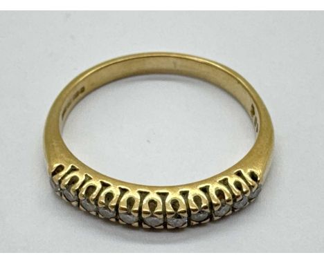A 9ct Gold Diamond Half Eternity Style Ring, circular claw set throughout, between tapered shoulders (finger size Q) (2.3gram