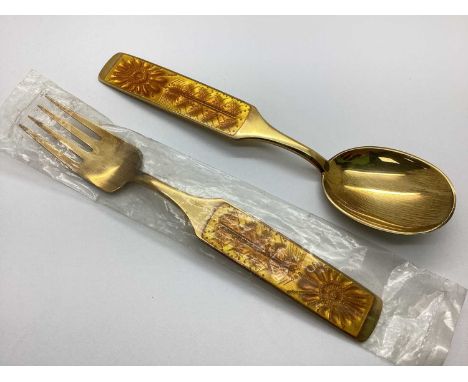 Julen 1967; A Danish Gilt Coloured Silver Enamel Fork and Spoon Set, London import mark, sunflower and foliage decoration to 