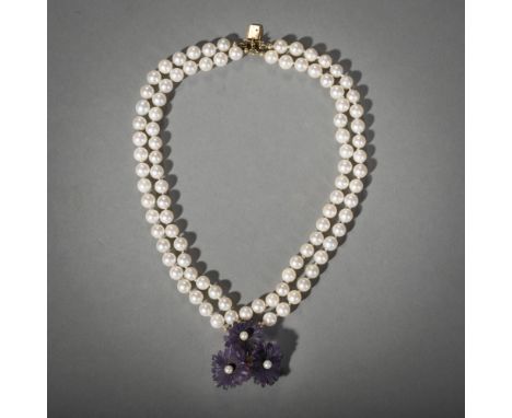 Perlarmband mit Amethyst-Blüten-Schliessewohl 1960er JahreL. 20 cmVierreihig, Zuchtperlen ca. 6,2 mm. 585/000 Gelbgoldschließ