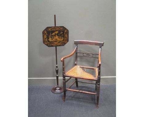 A 19th century firescreen pole, the canted rectangular chinoiserie scree decorated with a figure seated in a garden, 122cm hi
