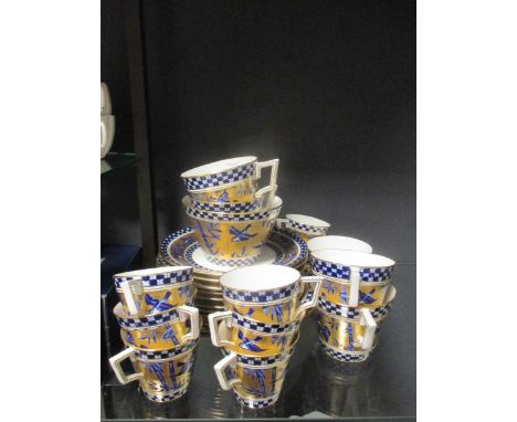 An aesthetic movement porcelain part tea and coffee service in the Japanesque manner the blue printed ground with birds amids