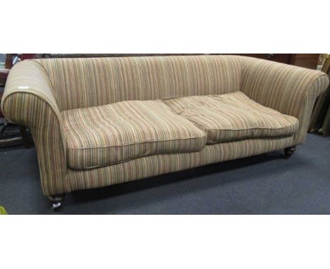 A Beaulieu large sofa upholstered in a narrow stripe fabric, on turned front legs and castors, 206cm wide, originally purchas