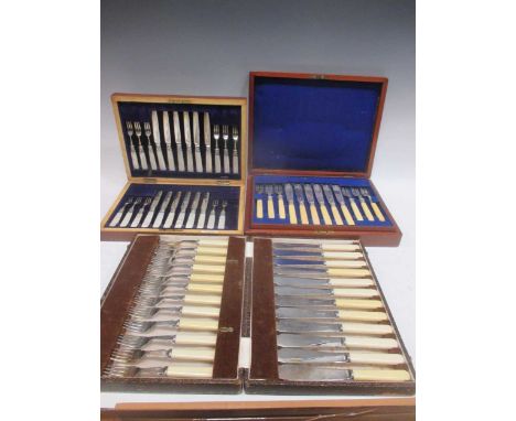 A silver bladed and mother of pearl fruit knife and fork set, lacking one fork, cased together with a cased silver-plated fis