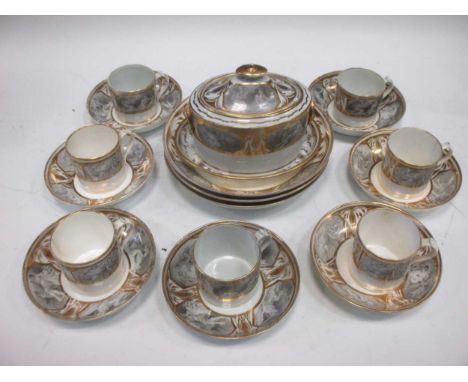 A Regency English porcelain tea service, comprising twelve teacups, fourteen coffee cans, twenty-two saucers, sucrier and cov