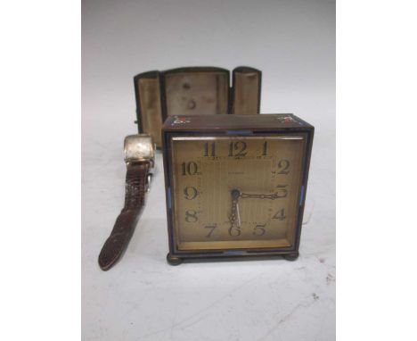 A 1930's gold cased gent's Longines wristwatch together with a 1930's Kienzle leather cased brass and enamel travel alarm clo