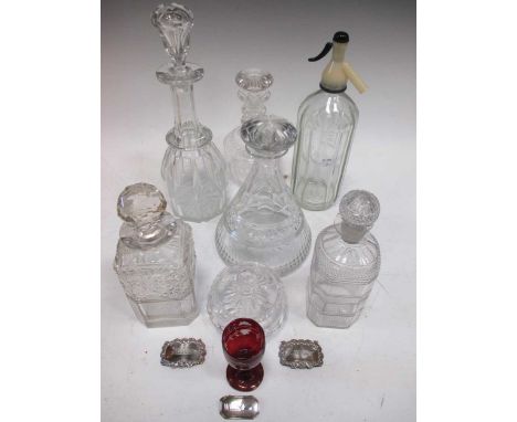 A collection of glassware together with three silver decanter labels, to include various decanters, glasses etc
