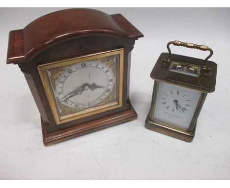 A Matthew Norman carriage clock together with a wooden cased mantel clock by Elliott (2)