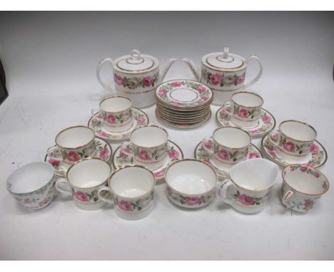A Royal Worcester Royal Garden 1969 part tea service with rose decoration