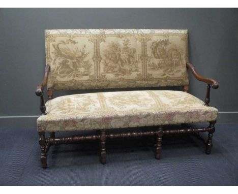 An 18th century style carved walnut country house sofa with tapestry panel upholstery on turned legs and stretchers, 150cm wi