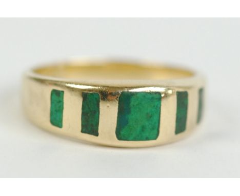 A 14ct yellow gold and malachite inset ring, size M½. 