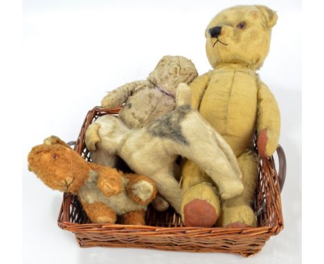 Four vintage toys to include a straw filled terrier and a rabbit, height 25cm (af) (4).