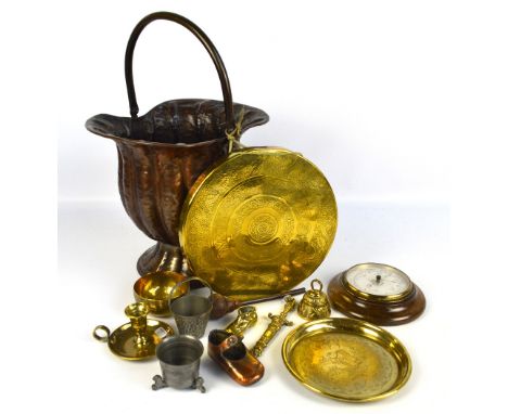 A small group of metalware including a copper coal bucket, a brass gong and chamberstick, also an oak circular barometer.