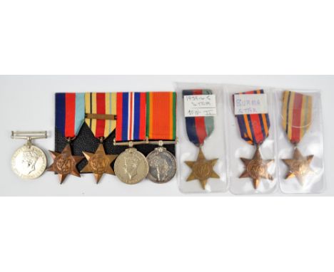 WWII War and Africa Service Medals and 1939-45 and Africa (with 8th Army Bar) Stars, all with later inscription to M1 6017 H.