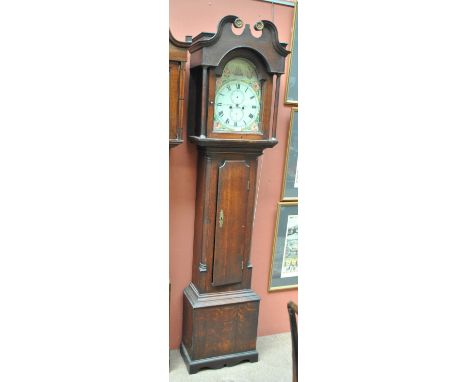 A 19th century oak longcase clock with broken swan neck pediment above arched repainted dial now inscribed 'Gill Bannaman Ban