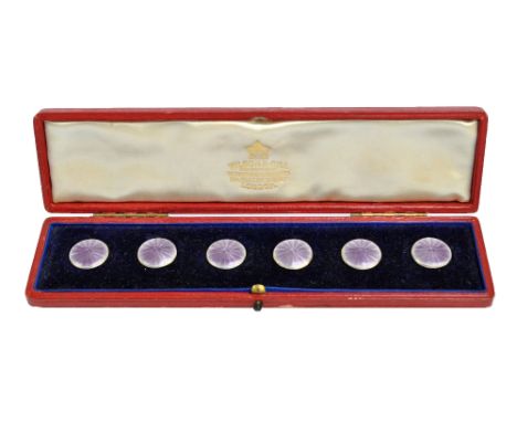 GOLDSMITHS & SILVERSMITHS CO LTD; a cased set of six Edward VII hallmarked silver and purple guilloche enamel decorated circu