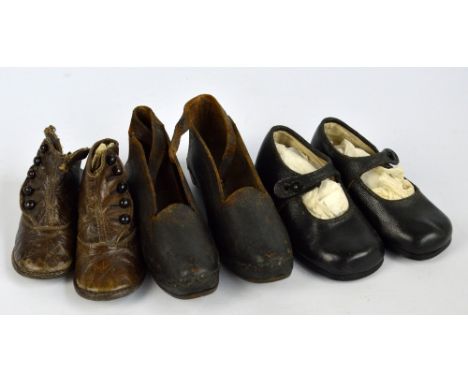 A pair of circa 1900 brown leather children's button boots (back af), a pair of circa 1940s children's size four bar shoes in