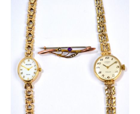 ROTARY; a 9ct yellow gold manual wind lady's wristwatch, the circular dial set with Arabic numerals, on gold gate link bracel