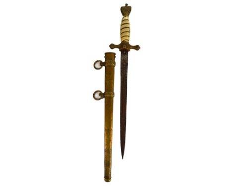 A 1950s reproduction Kriegsmarine dagger with marine ivory handle, with brass mounts and scabbard, the blade stamped 'WKC', l