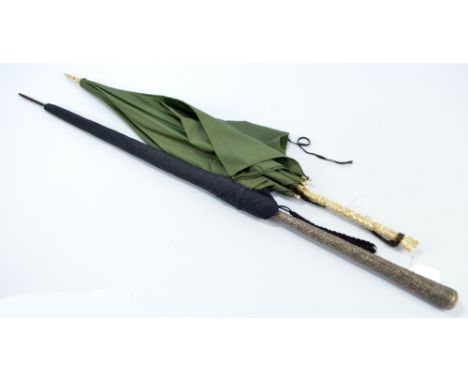 A 19th century green parasol with ivory handle, and bone finial and spoke ends, with gilt metal collar, length 85cm, and a S 
