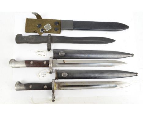 Two Chilean bayonets; M1895 and 1912, also a Guatemalan Cetme 69 bayonet, all three with scabbards (3).   CONDITION REPORT:  