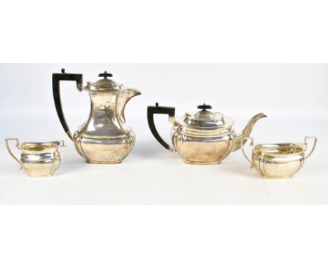 VINER'S LTD; a George VI hallmarked silver four piece tea set of lobed rectangular form, Sheffield 1937, length of teapot 30c