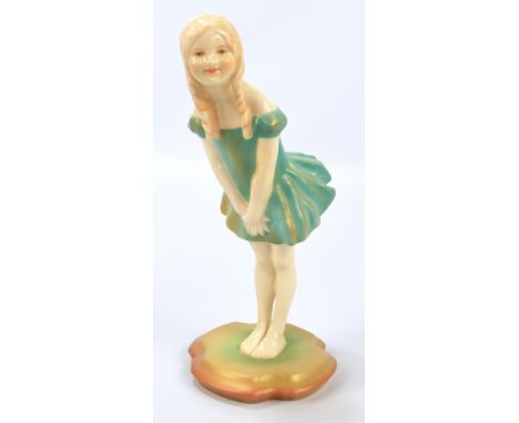 A Royal Worcester figure 'Sauee', modelled by Phoebe Stabler, puce printed marks to base, number 2881, height 18.25cm.