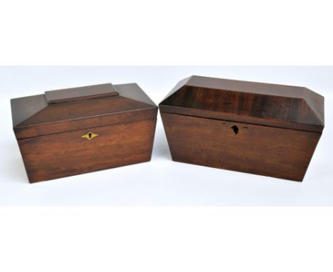 A Victorian mahogany sarcophagus tea caddy, width 30.5cm, and a further similar example, escutcheon missing, (both interiors 