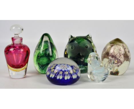 Three Kerry glass paperweights to include one modelled as an owl, two further examples and a Sark glass ruby tinted scent bot