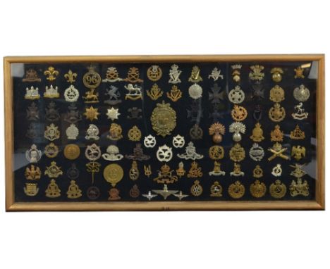 A collection of over ninety regimental/corps cap badges including SS Commando, SAS Who Dares Wins, Chester Volunteer Rifles, 