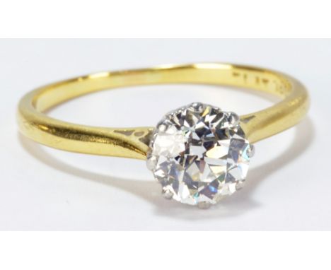 An 18ct yellow gold and platinum tipped diamond solitaire ring, the round antique cut stone weighing approx 1.20cts, colour I