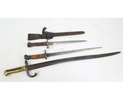 Three Dutch bayonets; 1873 Beaumont, 1895 and 1895 cavalry, one with scabbard (3).