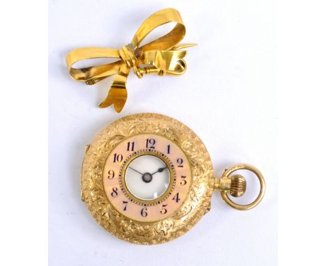 An early 20th century 15ct yellow gold half hunter crown wind fob watch overall engraved with floral motifs, the circular ena