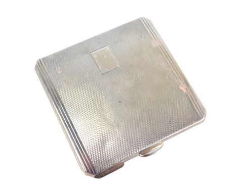 WILLIAM NEALE & SONS LTD; a George VI hallmarked silver engine turned decorated powder compact of square form with canted cor