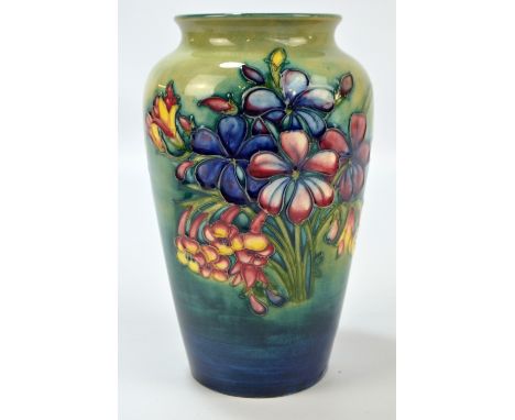 MOORCROFT; a 'Spring Flowers' pattern tubeline decorated vase, impressed marks and Walter Moorcroft signature in green to the