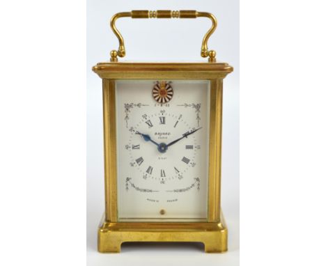 BAYARD; a French eight day brass carriage clock, the white dial set with Roman and Arabic numerals, the back plate and door s