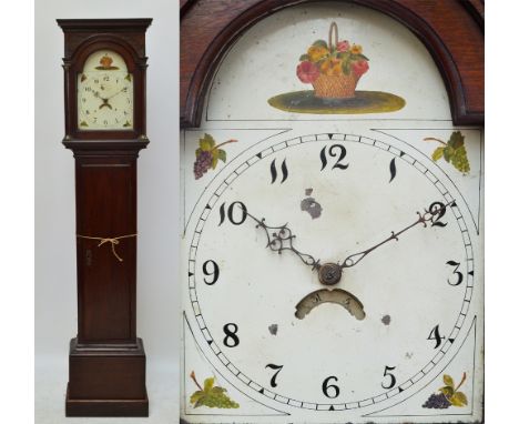 A late 18th/early 19th century oak longcase clock, the moulded cornice pediment above domed enamel face, painted with fruit m