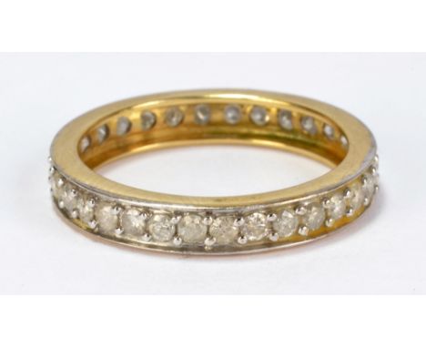 A 9ct yellow and white gold diamond set full eternity ring, size P 1/2 approx. 2g.