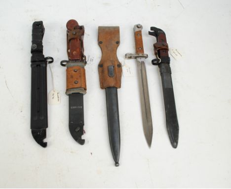 Three Bulgarian and one Romanian bayonet; AK47 x2, and 1895 (all Bulgaria) and AKN type 1 Romanian, all four with scabbards.