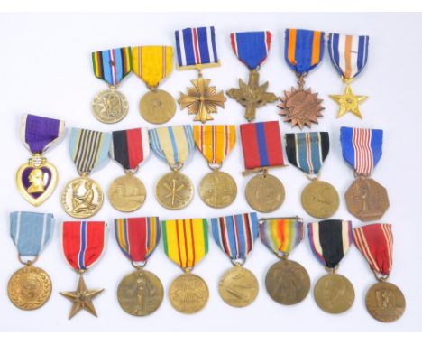 A group of United States medals to include Purple Heart, Silver Star, Armed Forces Reserve Medal, Good Conduct Medal, Army of