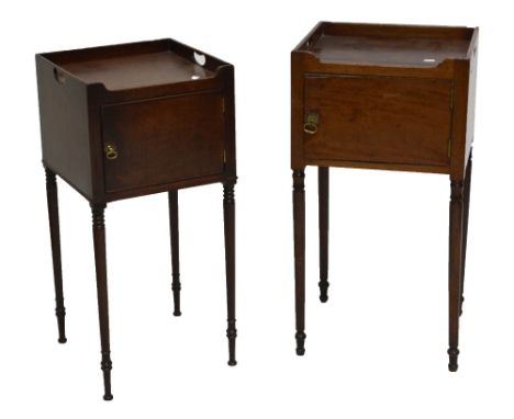 Two similar early 19th century mahogany night tables with gallery tops, cupboard doors and ring turned tapering legs (2).
